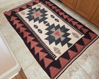 Rug measurements: 5'5" x 3'7"