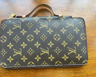 We do not authenticate any merchandise (possible LV)