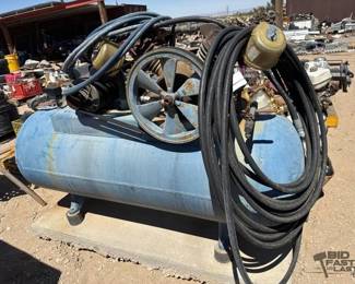2247 Air Compressor with GE Motors AC Motor on Cement Block
