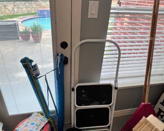 Dog carrier backpack, beach umbrellas, two step ladder, rake