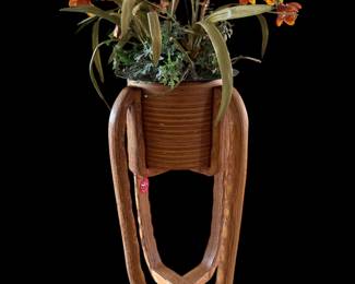 This unique planter is approximately 40” tall.
You have to see it in person to appreciate its uniqueness.
The floral arrangement is sold separately