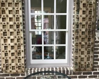 Wooden and metal window shutters