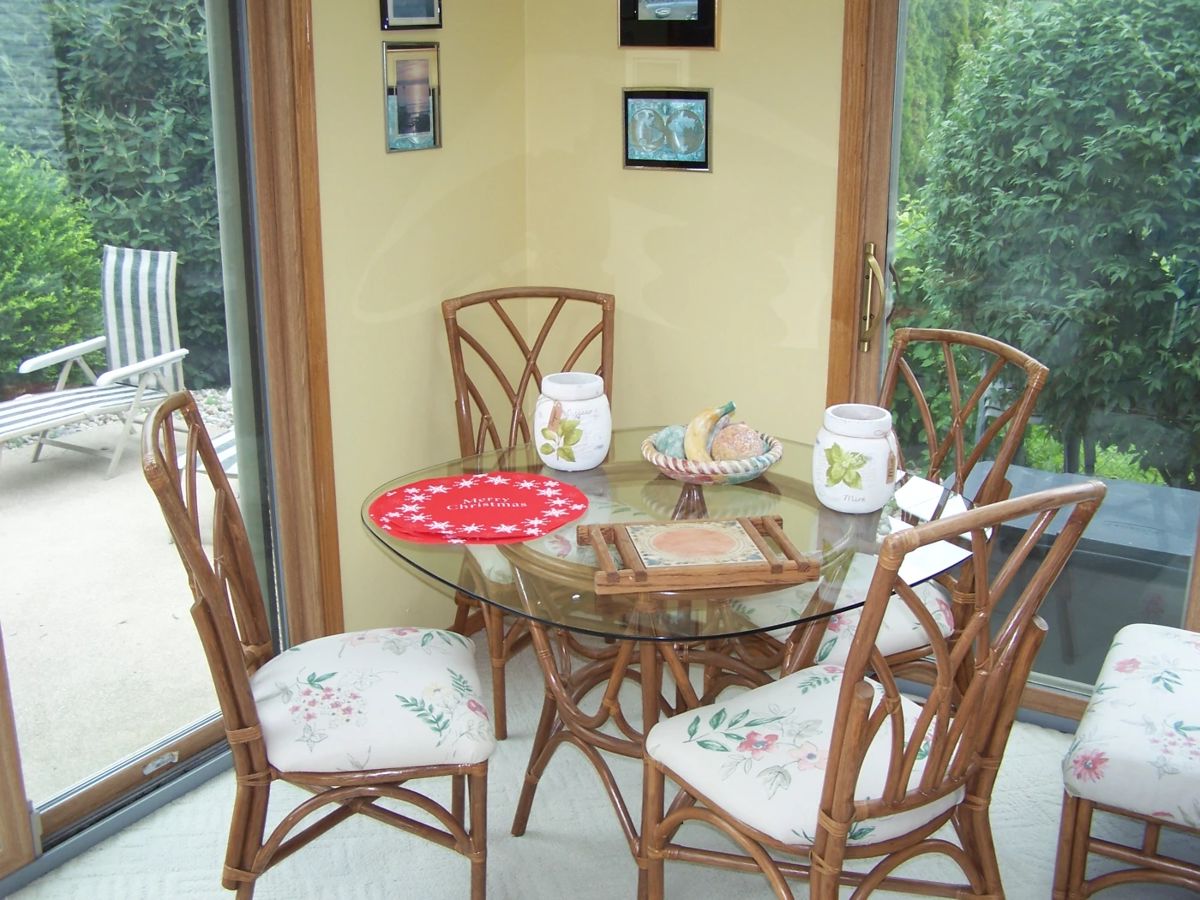 GLASS-TOP TABLE & RATTAN CHAIRS