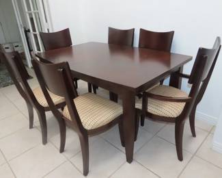 Dining table/6 chairs and extra leaf.