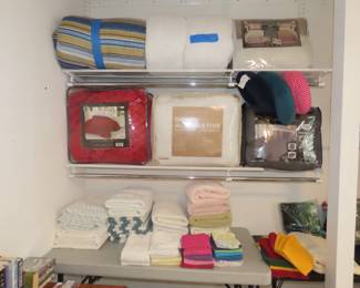 Brand new comforters, blankets, goose down quilts, towels and throws.
