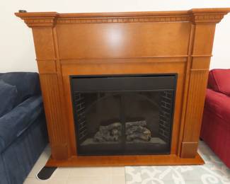 Tall fire place with remote control.