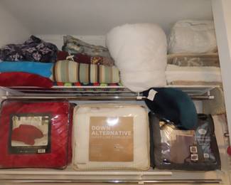 Brand new comforters, blankets, goose down quilts.