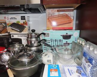 New in boxes 32 piece kitchen set, grilling tray, panini press, cookware.
