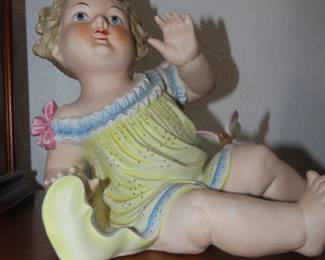 Bisque china figure.