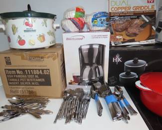 New in boxes tamale steamer, coffee maker, copper griddle.