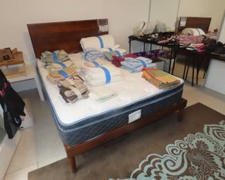 Bedroom area, sheets and linens.