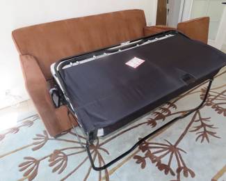 Brown sleeper sofa.