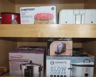 Brand new in boxes, slow cooker, deep fryer, dehydrator, mini chopper.