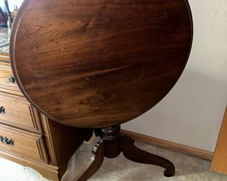 round tilt top table