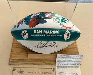 Signed 1984 Dan Marino limited edition football from 1984. Clearly showing is the COA and in a nice acrylic/wood display case.