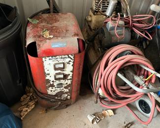 vintage battery charger and an air compressor.
