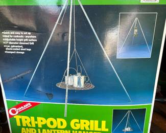 New in box - tripod, grill and/or lantern hanger. Excellent tool to have around the campfire..