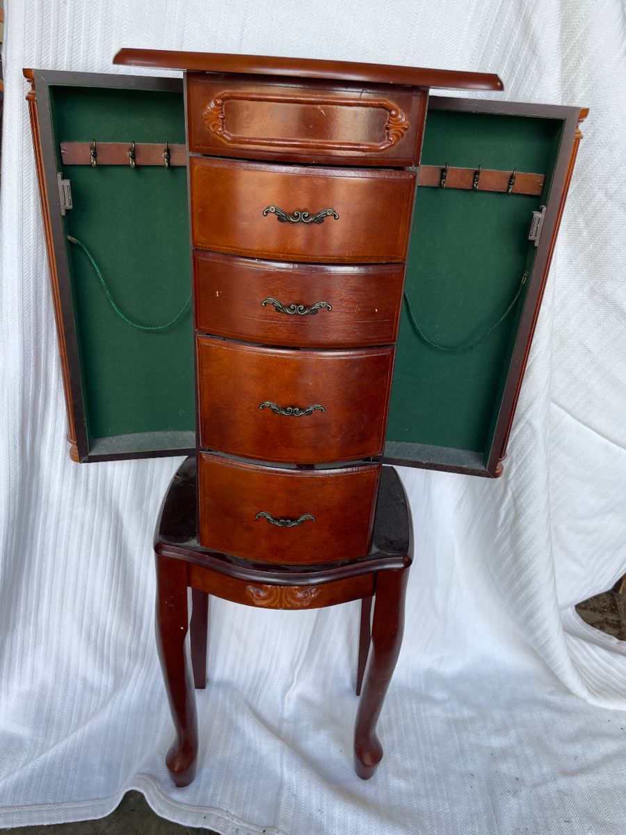 vintage wooden jewelry armoire or jewelry cabinet