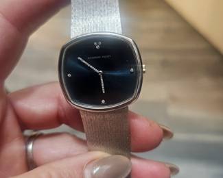 Unisex 18kt white gold Audemars Piguet serpentine and diamond watch with blue face...papers included and in perfect condition....super heavy too