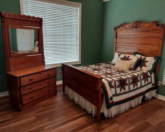 Antique Full Size Bed and Dresser. Headboard 57" Wide, 76" Tall, 78" Long, Dresser 39" W, 18" D, 30" T, 76" Tall including attached mirror.