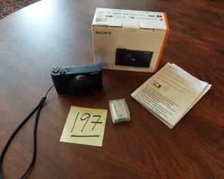 Sony DSC-HX80 Camera with 2 batteries Working Condition! No charger for batteries but charged to see operational.