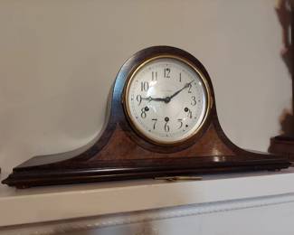 Westminister Chimes. Vintage Seth Thomas Camel Back Mantle Clock Westminister Chimes, Runs and stops, 18" W, 9" T.