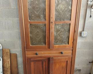 Punched tin cabinet