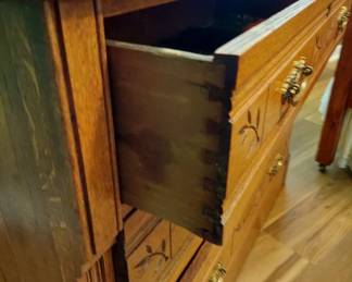Antique Full Size Bed and Dresser. Headboard 57" Wide, 76" Tall, 78" Long, Dresser 39" W, 18" D, 30" T, 76" Tall including attached mirror.