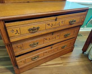 Antique Full Size Bed and Dresser. Headboard 57" Wide, 76" Tall, 78" Long, Dresser 39" W, 18" D, 30" T, 76" Tall including attached mirror.
