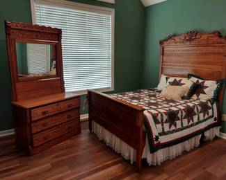 Antique Full Size Bed and Dresser. Headboard 57" Wide, 76" Tall, 78" Long, Dresser 39" W, 18" D, 30" T, 76" Tall including attached mirror.