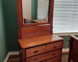 Antique Full Size Bed and Dresser. Headboard 57" Wide, 76" Tall, 78" Long, Dresser 39" W, 18" D, 30" T, 76" Tall including attached mirror.