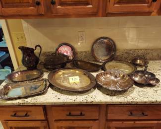 12 Pieces of Silver Plate, International Silver, Wallace and more.
