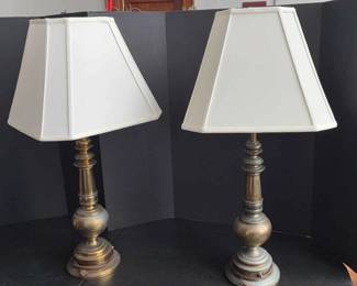 A Pair Of Brass Lamps