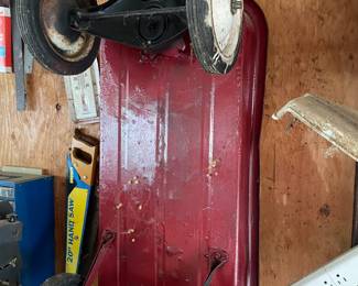 Old red steel wagon