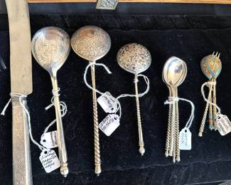 Vintage spoons, many from Russia