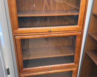 Display bookcase with glass flip top doors