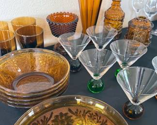 Vintage glasswares, including:
Federal glass ribbed refrigerator covered dishware in “Golden Glo” and vegetable imprint
Tiara Amber Indiana Glass canisters
LE Smith Amber Hay Glass in “Moon + Stars”
Fostoria Coin Glass amber bowls