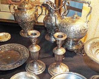 ANTIQUE S. KIRK & SONS STERLING REPOUSSE LEAFY BERRY PITCHER
ANTIQUE STERLING REPOUSSE LIDDED CONTAINER WITH VILLAGE IMAGES AND STERLING SILVER FLUTED COLUMN CANDLEHOLDERS
