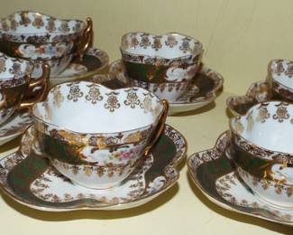 DELICATE BAVARIAN GERMAN PORCELAIN DECORATED WITH GOLD GILT AND HANDPAINTED FLOWERS DEMI TASSE SHAPED CUPS AND SAUCERS