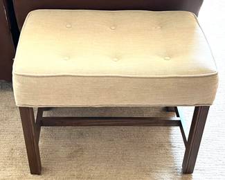 Nice beige upholstered ottoman!