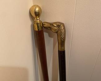 Brass topped walking canes 