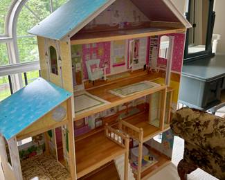 KidKraft Majestic Mansion Wooden Dollhouse -  Working Elevator and Garage - comes with some of the accessories.