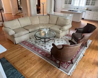 Henredon Upholstered Sectional Sofa (LAF Loveseat - 41"D x 64"W x 34" Back Height, Center Chair - 47"D x 80"W x 34" Back Height, RAF Chair - 42"D x 38"W x 34" Back Height) & Iron Base with Glass Top Round Coffee Table (42"D x 19-1/2"H) & Southwood Mahogany Base with Brown Leather Upholstered Armchair (27"W x28"D x 38" Back Height / 2 Available)