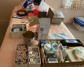 A good selection of vintage sewing fabric and notions