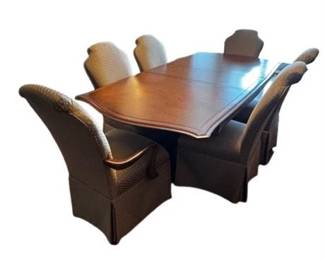 Lot 012-193
Formal Dining Table With Upholstered And Skirted Chairs