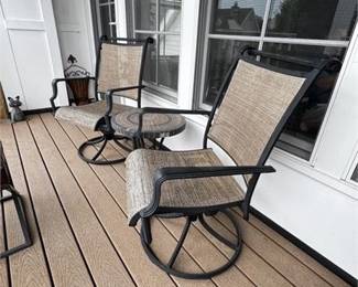 Lot 196
Patio Set Of Two Swivel Chairs, Mosaic Table, Bench