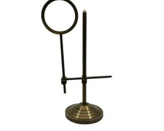 Lot 240
Antique Hands-Free Brass Magnifying Glass