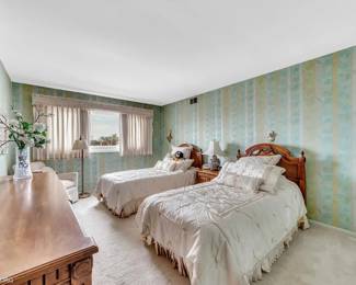Bedroom set with 2 twin bed headboards, nightstand, dresser and mirror.