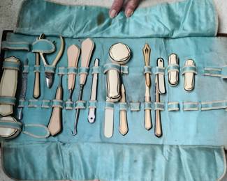 Antique Manicure and Grooming Tooled Leather Case with Ivory Celluloid and Metal Instruments