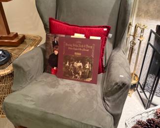 Wingback Chair, Books, Throw Pillows